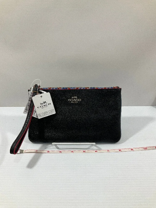 Wristlet Designer By Coach, Size: Medium